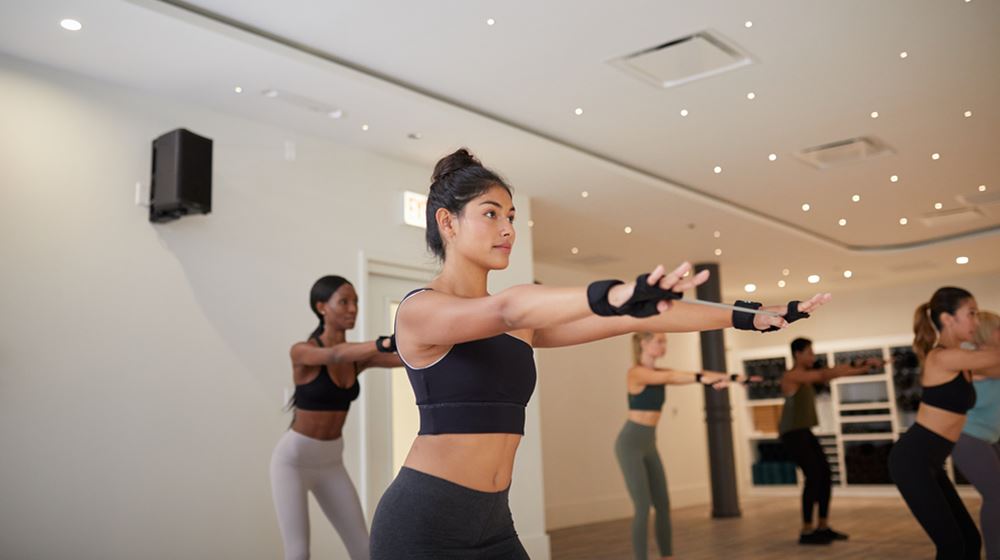 Group of women exercising at a P.volve fitness franchise studio